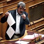 Minister,of,health,pavlos,polakis,attends,in,a,discussion,and