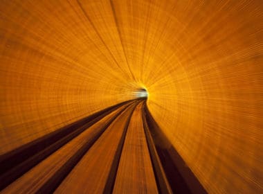 Long,exposure,inside,a,lighted,tunnel