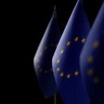 Small,national,flags,of,the,european,union,on,a,dark