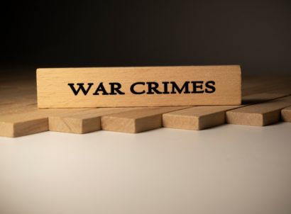 War,crimes,written,on,wooden,surface ,law,and,state