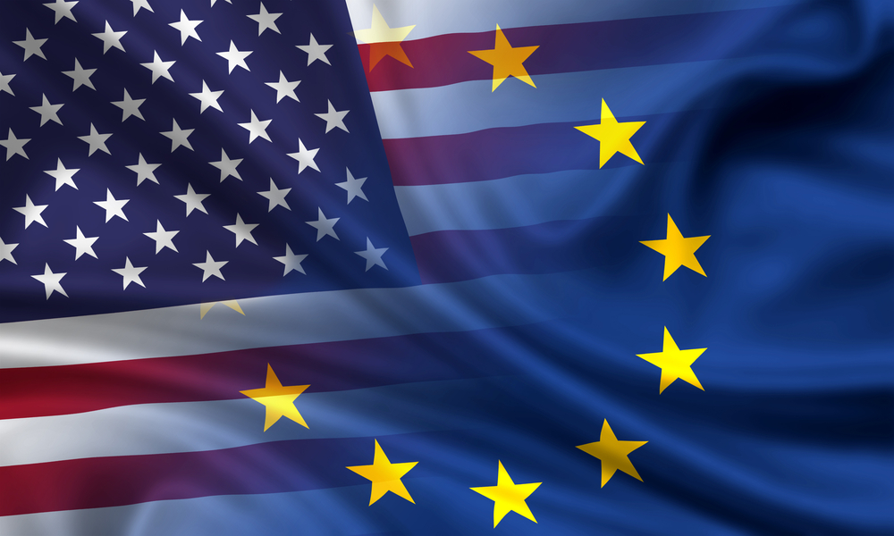 Combined,waving,flags,of,usa,and,eu