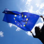 Young,woman,holding,european,union,flag ,voting,,election,concept