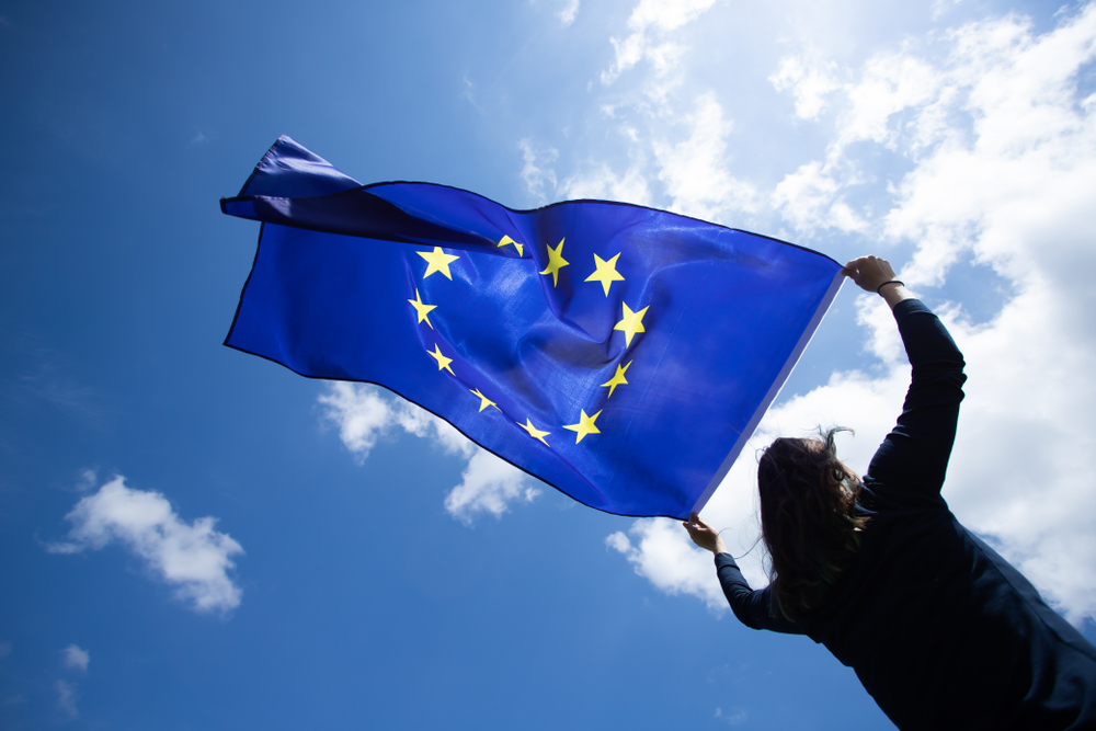 Young,woman,holding,european,union,flag ,voting,,election,concept