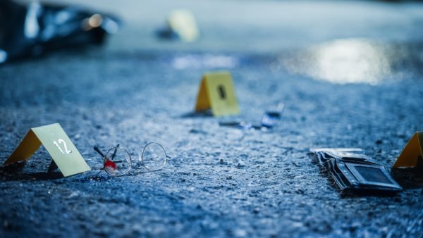 Bloodied,glasses,,bloody,knife,and,empty,wallet,,all,marked,as