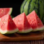 Slices,of,fresh,watermelon,on,the,rustic,wooden,table