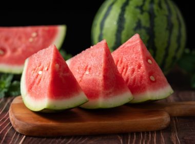 Slices,of,fresh,watermelon,on,the,rustic,wooden,table