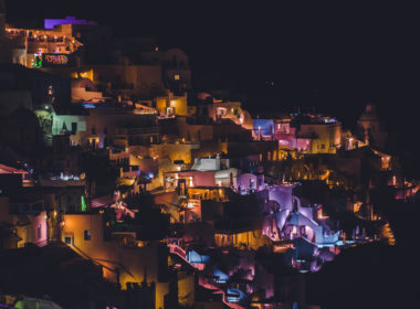 A,colorful,night,city,lights,of,a,houses,in,thira