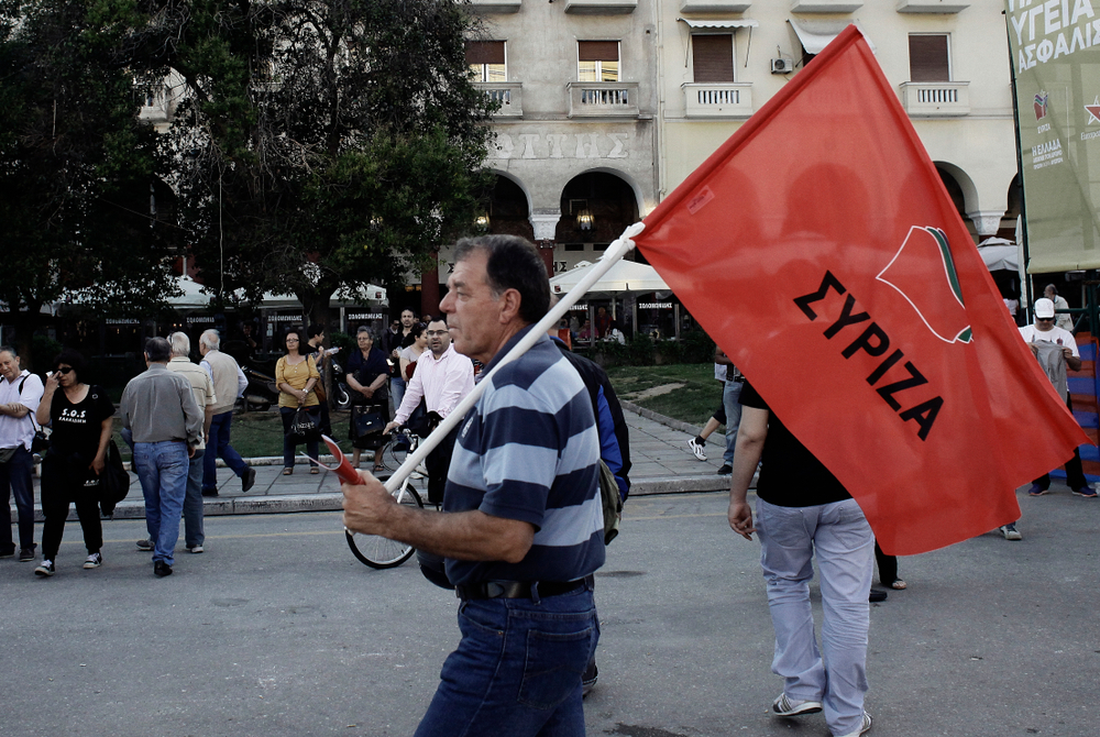 Greek,left wing,opposition,supporters,listen,to,the,speech,of,the