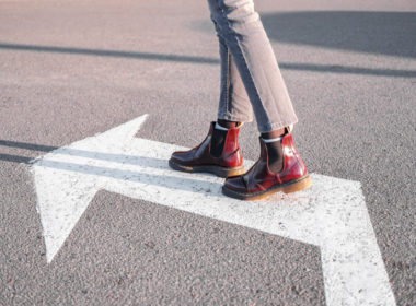 Feet,walking,along,the,left,turn,sign ,concept,of,making