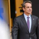 Greece's,prime,minister,kyriakos,mitsotakis,arrives,for,a,eu,summit,