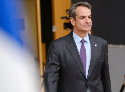 Greece's,prime,minister,kyriakos,mitsotakis,arrives,for,a,eu,summit,