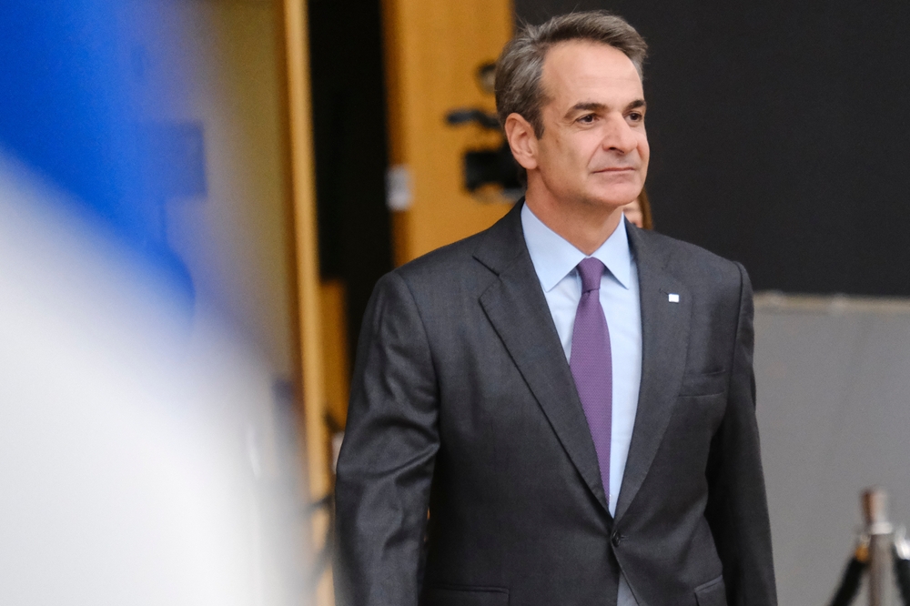 Greece's,prime,minister,kyriakos,mitsotakis,arrives,for,a,eu,summit,