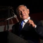 Former,israeli,prime,minister,benjamin,netanyahu,speaks,during,a,protest