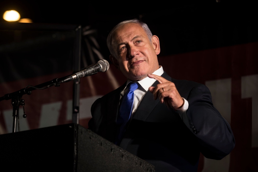 Former,israeli,prime,minister,benjamin,netanyahu,speaks,during,a,protest