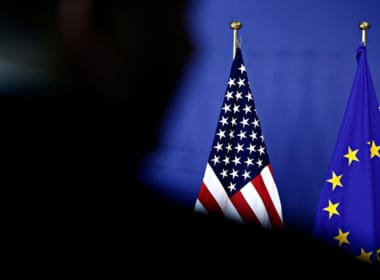 Eu,and,u s,flags,during,a,media,conference,of,u s