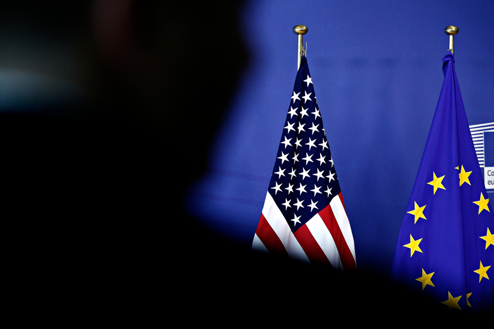 Eu,and,u s,flags,during,a,media,conference,of,u s