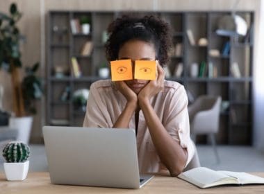 Tired,afro,american,millennial,student,girl,sleeping,at,workplace,with