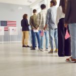 Group,of,american,citizens,people,standing,in,polling,station,with