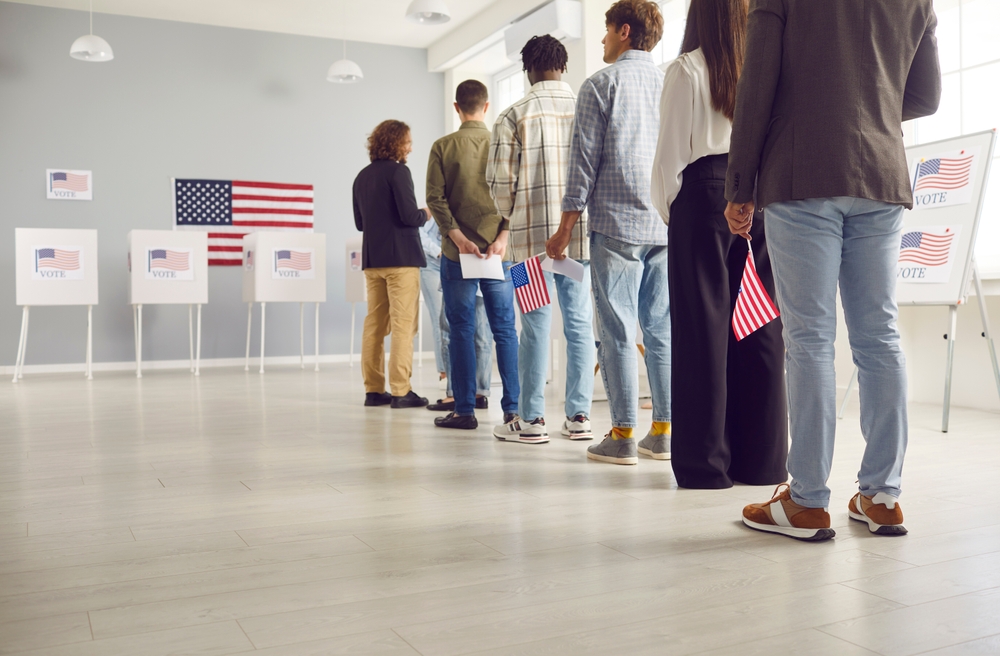 Group,of,american,citizens,people,standing,in,polling,station,with