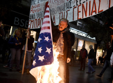 Thessaloniki,,greece, ,november,17,,2015 ,a,man,burns,a
