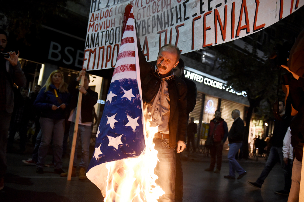 Thessaloniki,,greece, ,november,17,,2015 ,a,man,burns,a