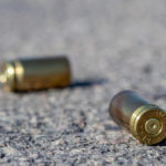 Casings,and,cartridges,lie,on,the,ground