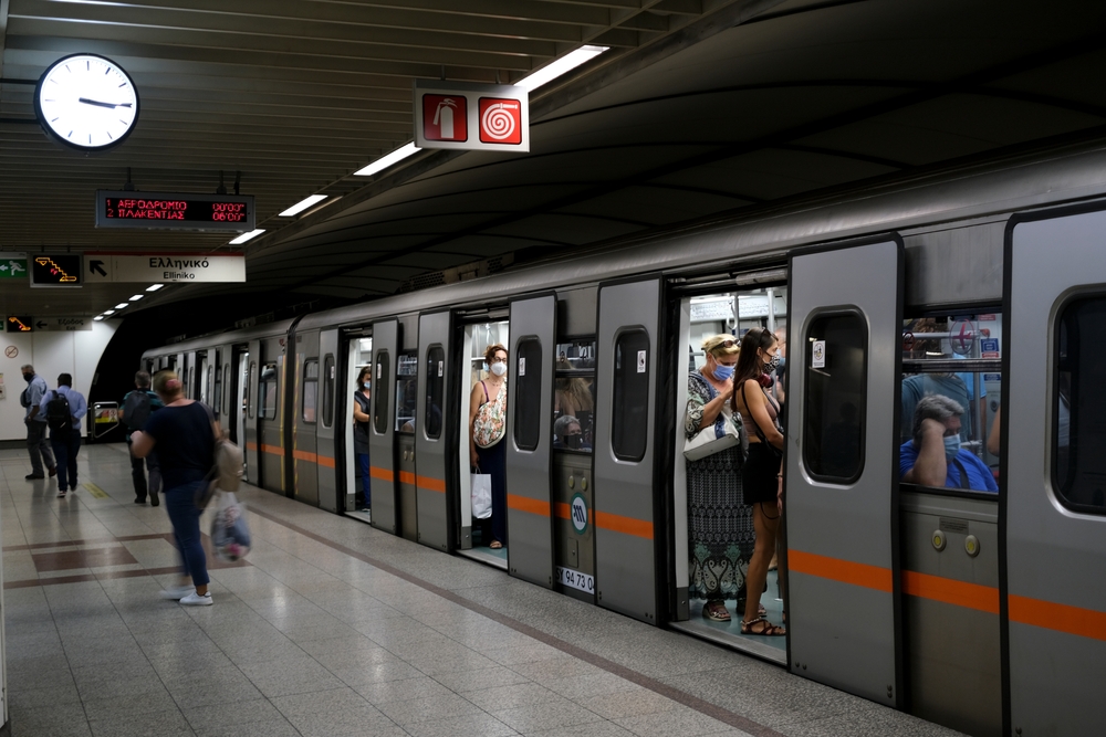 People,wait,on,a,metro,platform,in,athens,,greece,on