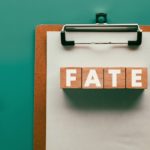 There,is,wood,cube,with,the,word,fate ,it,is