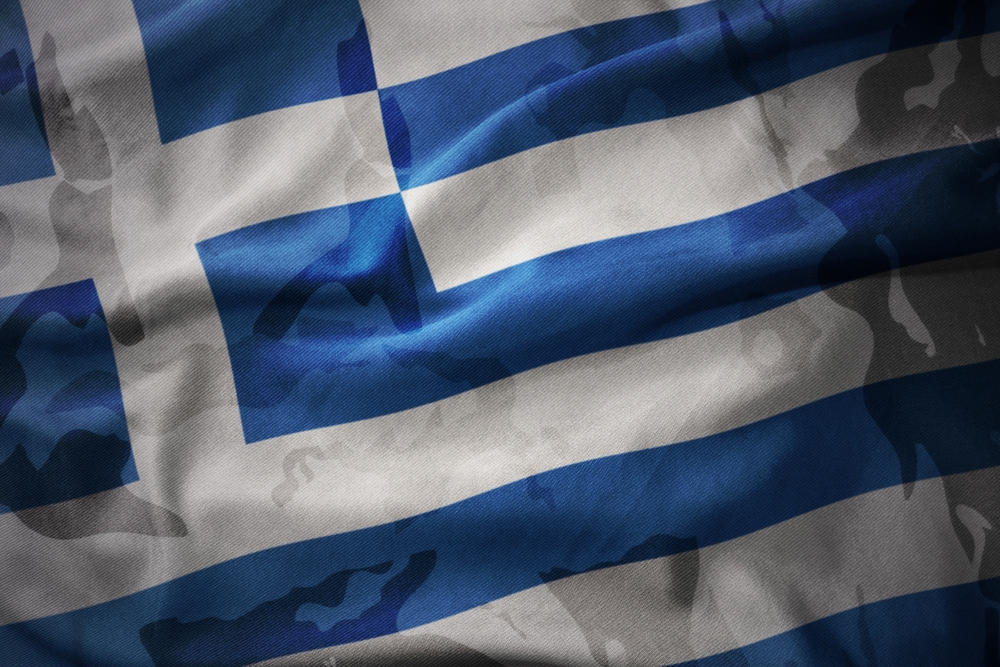 Colourful,waving,flag,of,greece,on,the,old,army,khaki