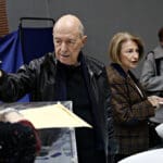 Former,greek,prime,minister,costas,simitis,casts,his,ballot,during