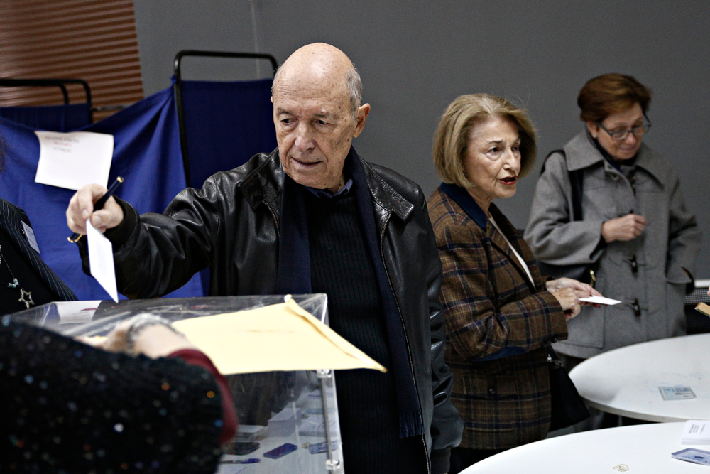 Former,greek,prime,minister,costas,simitis,casts,his,ballot,during