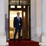 Greece's,prime,minister,kyriakos,mitsotakis,waits,for,a,meeting,at