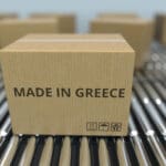 Boxes,with,made,in,greece,text,on,roller,conveyor ,greek