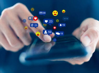 Close up,hands,holding,and,touch,screen,to,communicate,with,others