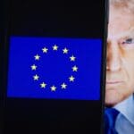 The,european,union,flag,is,displayed,on,a,smartphone,,with