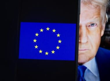 The,european,union,flag,is,displayed,on,a,smartphone,,with