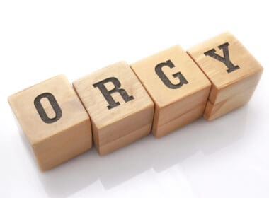 Orgy,word,made,with,building,blocks,isolated,on,white