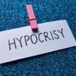 Hypocrisy,writting,on,blue,background