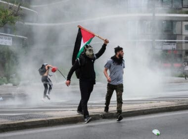 Riot,police,use,pepper,spray,and,a,water,cannon,against