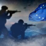 Silhouettes,of,soldiers,at,war,with,the,european,flag