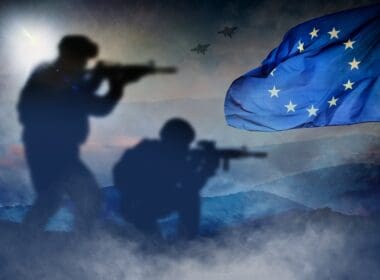 Silhouettes,of,soldiers,at,war,with,the,european,flag