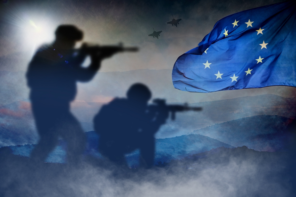 Silhouettes,of,soldiers,at,war,with,the,european,flag