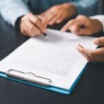 Business,people,signing,contract,making,deal,with,life,insurance,agent