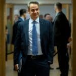 Greece's,prime,minister,kyriakos,mitsotakis,arrives,for,a,eu,summit,