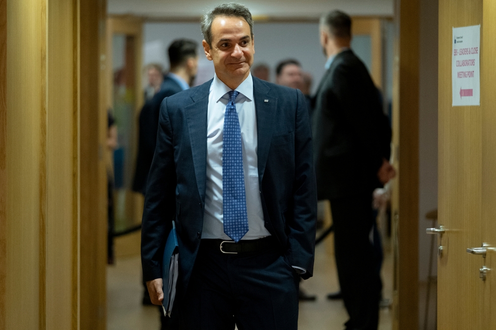 Greece's,prime,minister,kyriakos,mitsotakis,arrives,for,a,eu,summit,