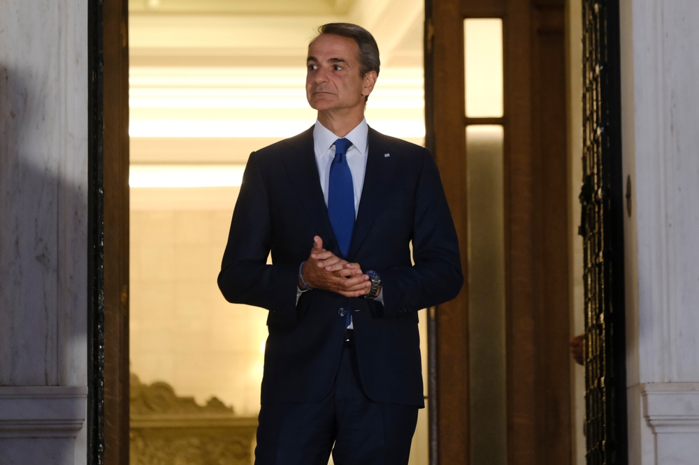 Greece's,prime,minister,kyriakos,mitsotakis,waits,for,a,meeting,at