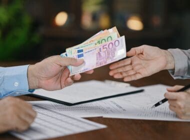 Euro,banknotes,money,on,hand ,concept,of,personal,loan,,home