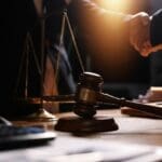 Attractive,young,lawyer,in,office,business,woman,and,lawyers,discussing