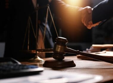 Attractive,young,lawyer,in,office,business,woman,and,lawyers,discussing