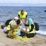 Lesvos,,greece, ,september,29,,2015:,refugee,given,help,after